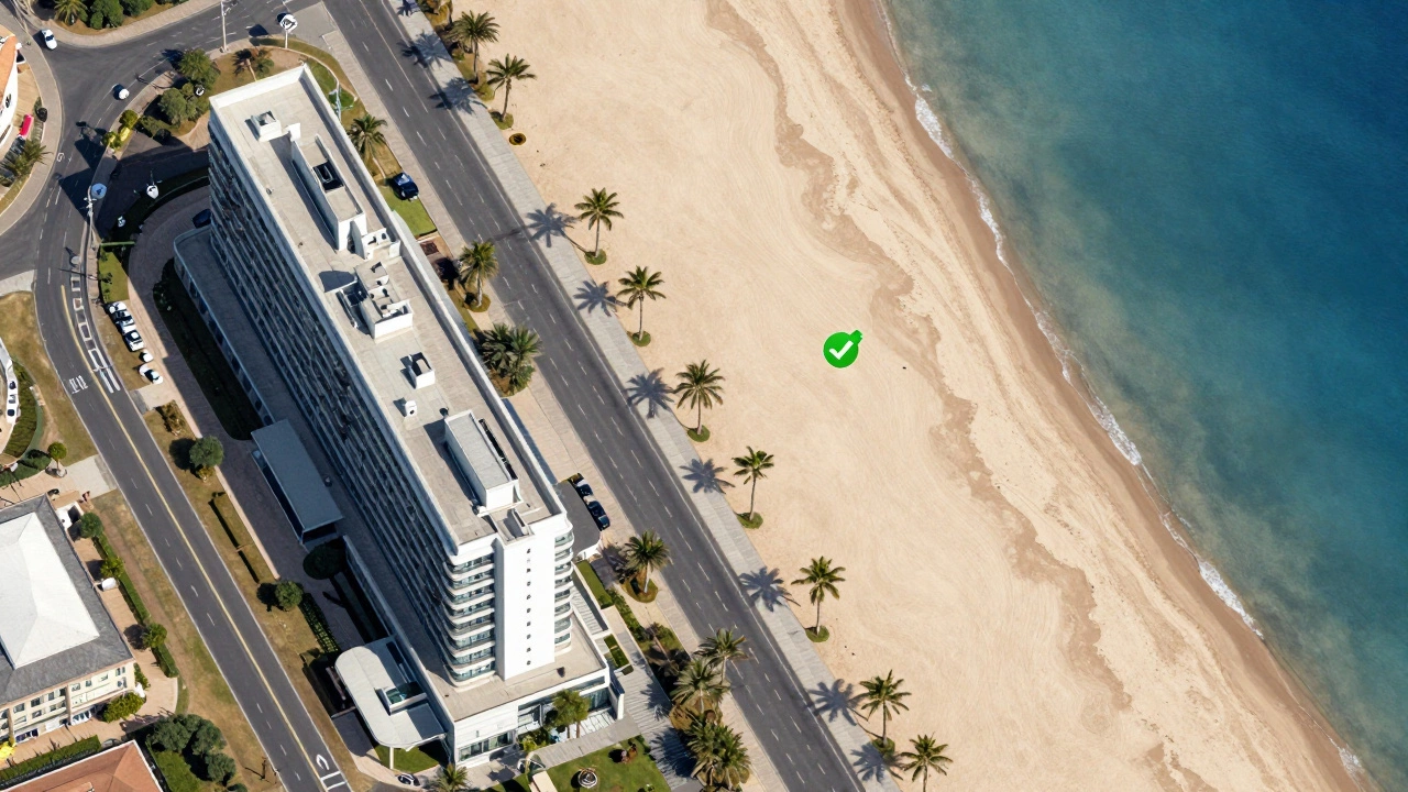 Satellite view showing distance and barriers between hotel and beach
